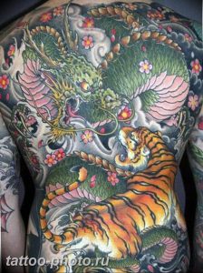 фото тату тигр и дракон 07.12.2018 №015 - tattoo tiger and dragon - tattoo-photo.ru